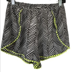 Like Chili Shorts Size Small. Black, White and Yellow trim.